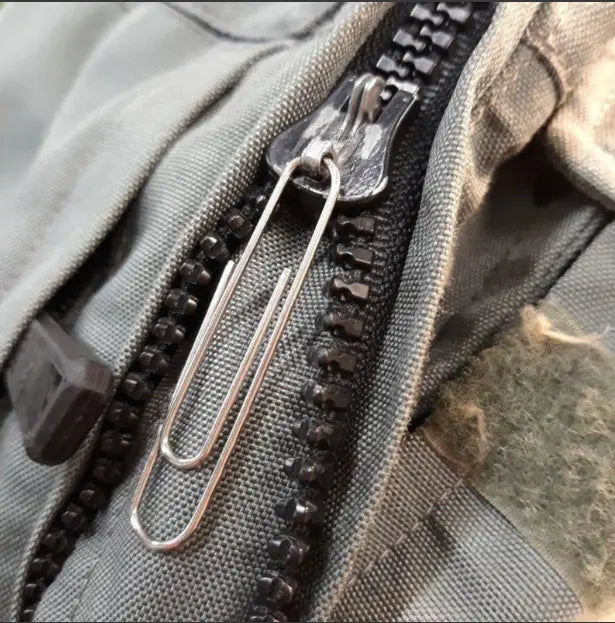 using bobby pins or paper clips to pull the zipper up