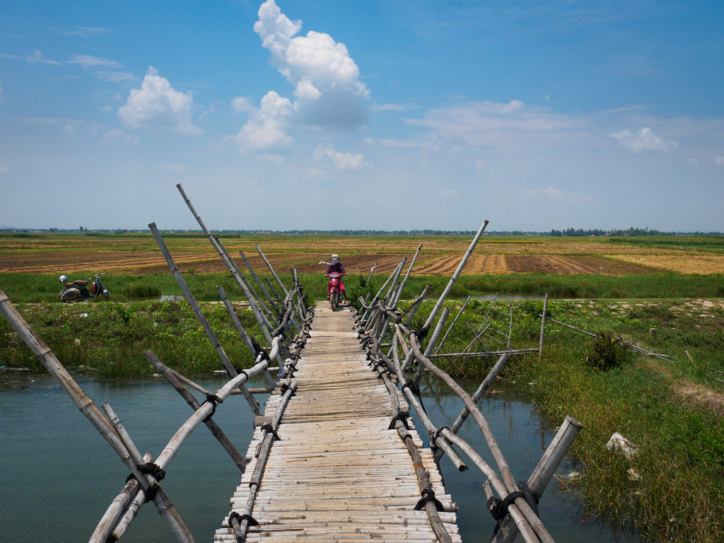 Bamboo bridge in Hoi An, Vietnam Vespa Adventures