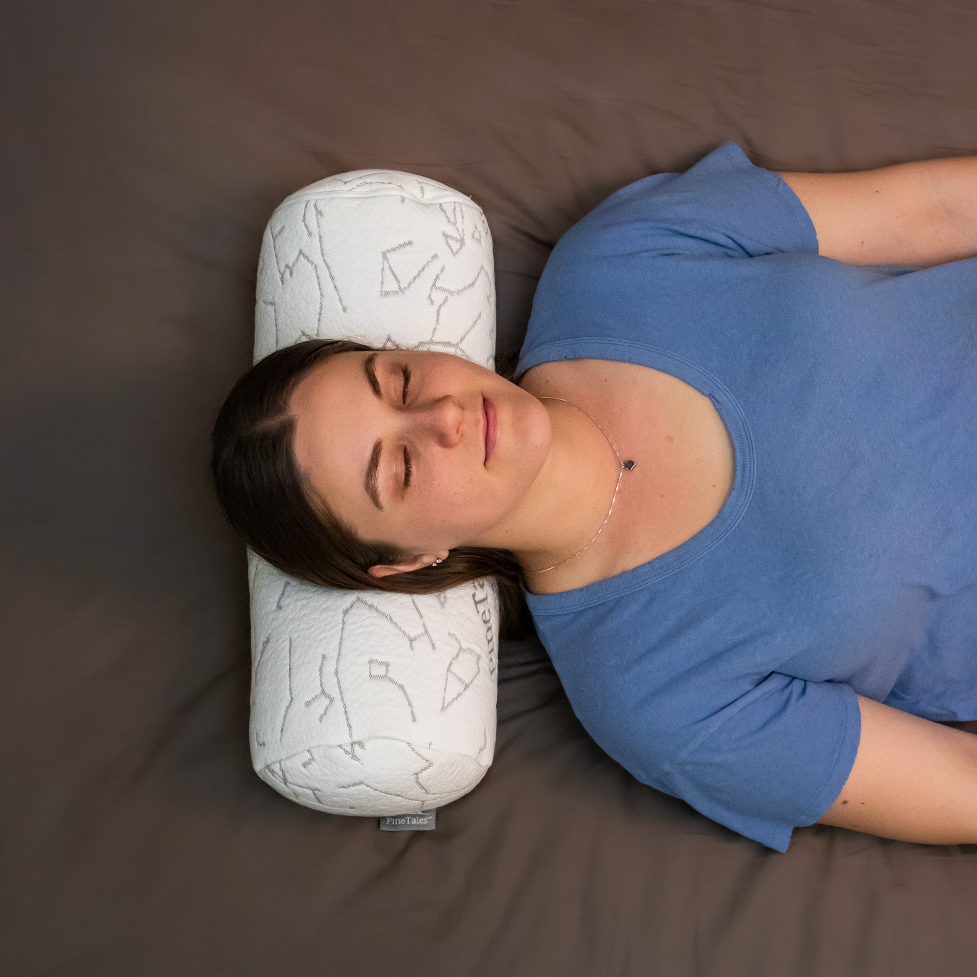 Woman Sleeping on Buckwheat Neck Roll Pillow
