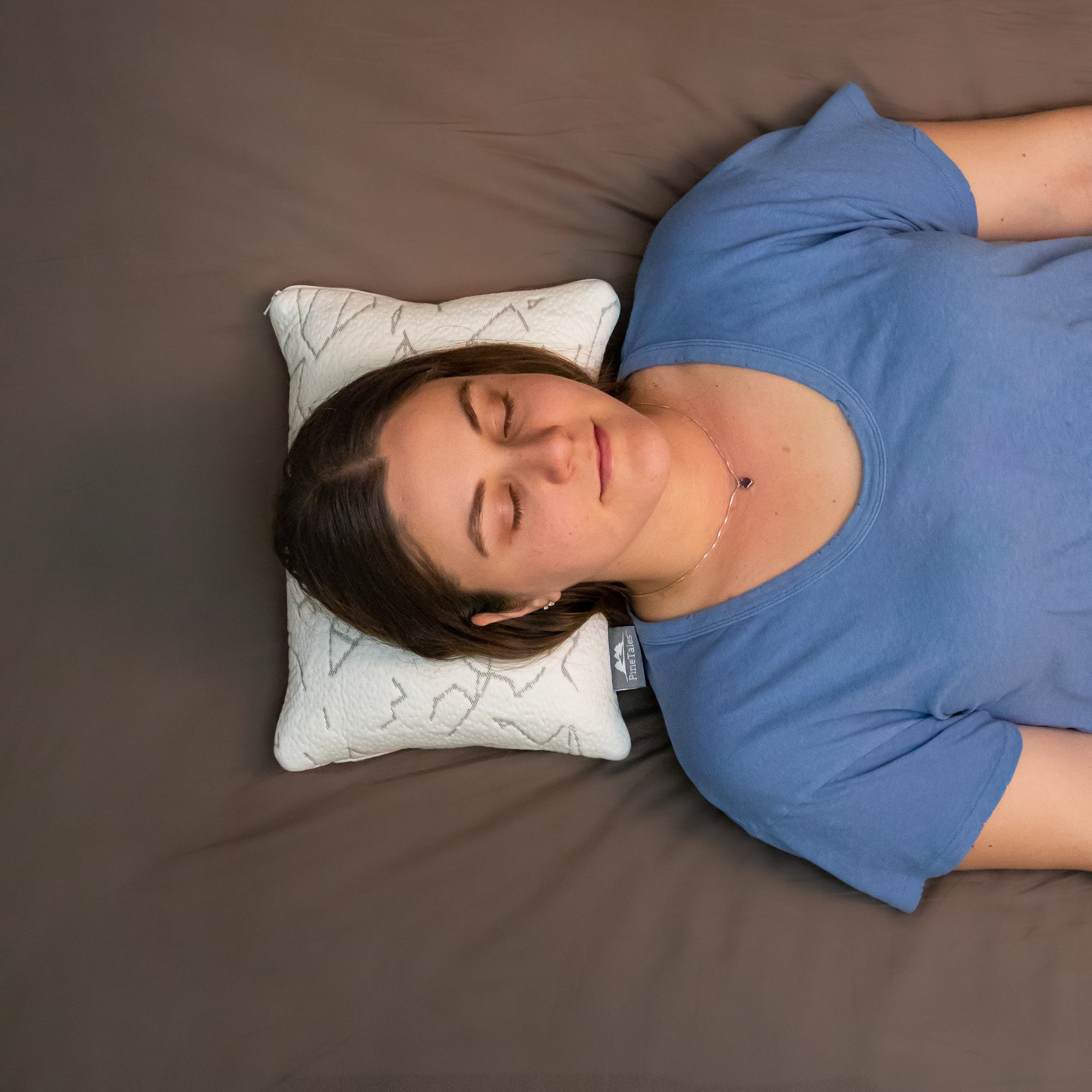 Young Woman Sleeping on Travel Size Buckwheat Pillow