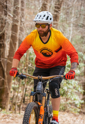 orange mountain bike clothing