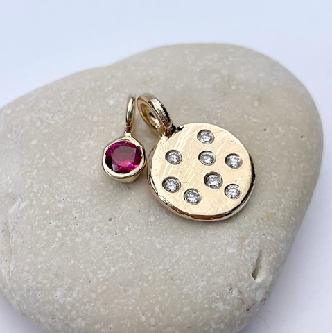 diamond_scatter_disc_pendant_bezel_ruby