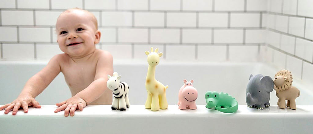 Baby playing in there bath with baby teething toys