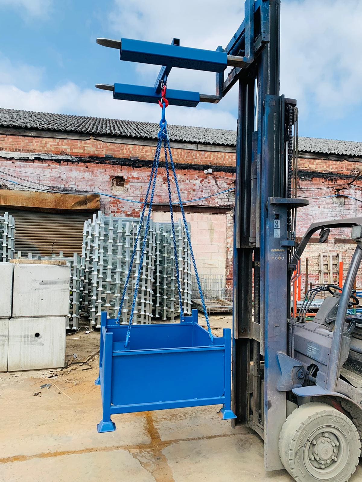 Image of stillage being lifted by forklift crane