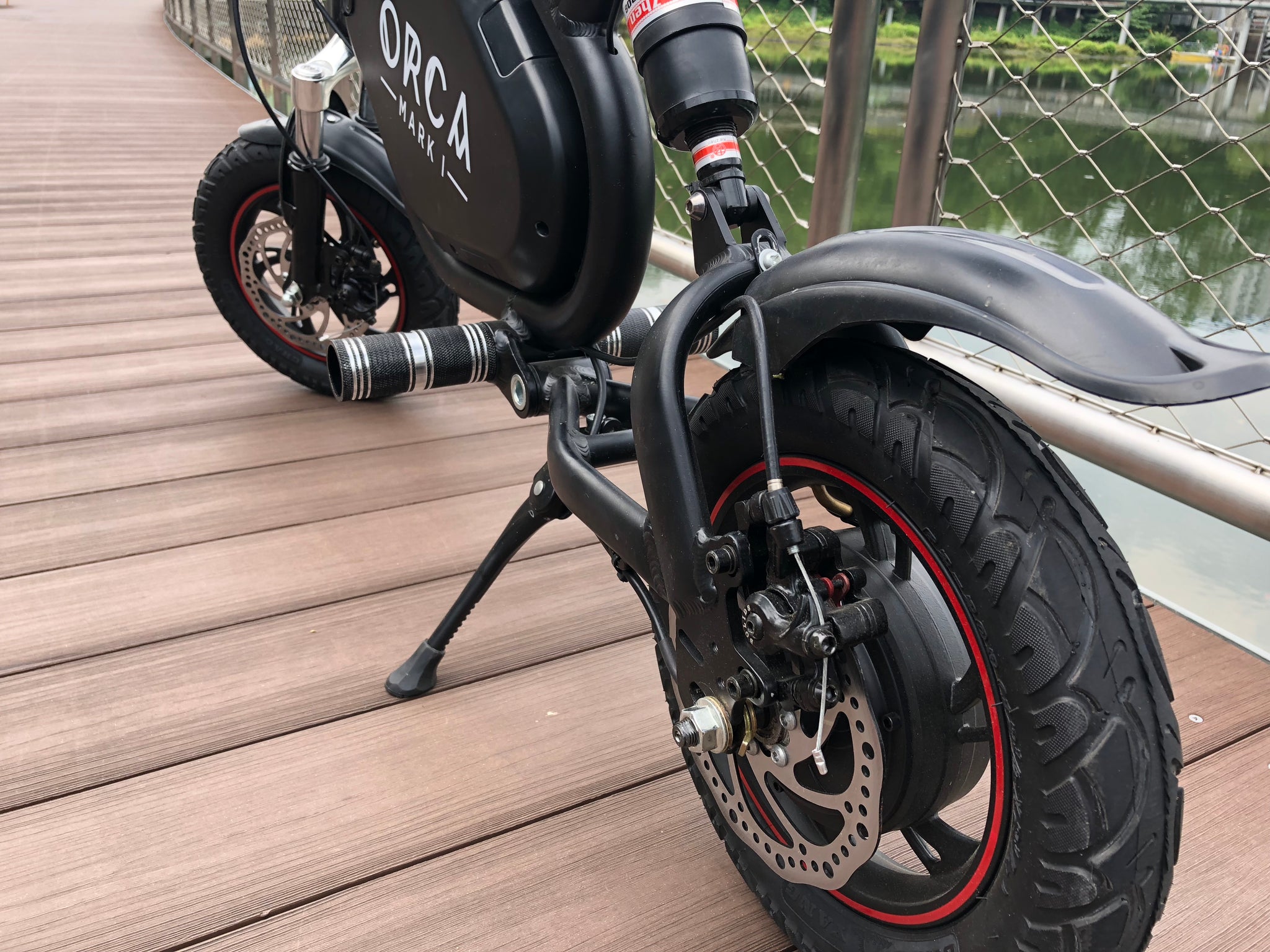 ORCA Mark I electric scooter front and rear disc brakes
