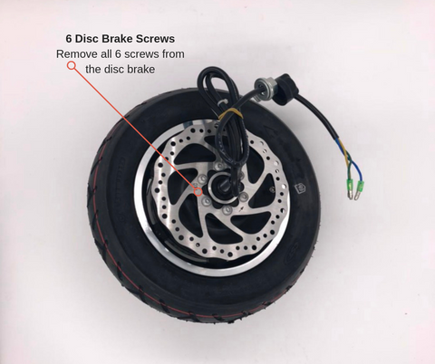unscrew and remove disc brake
