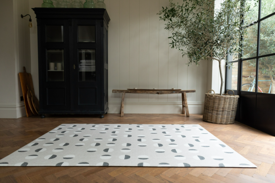 The eclipse monochrome play mat by totter and tumble