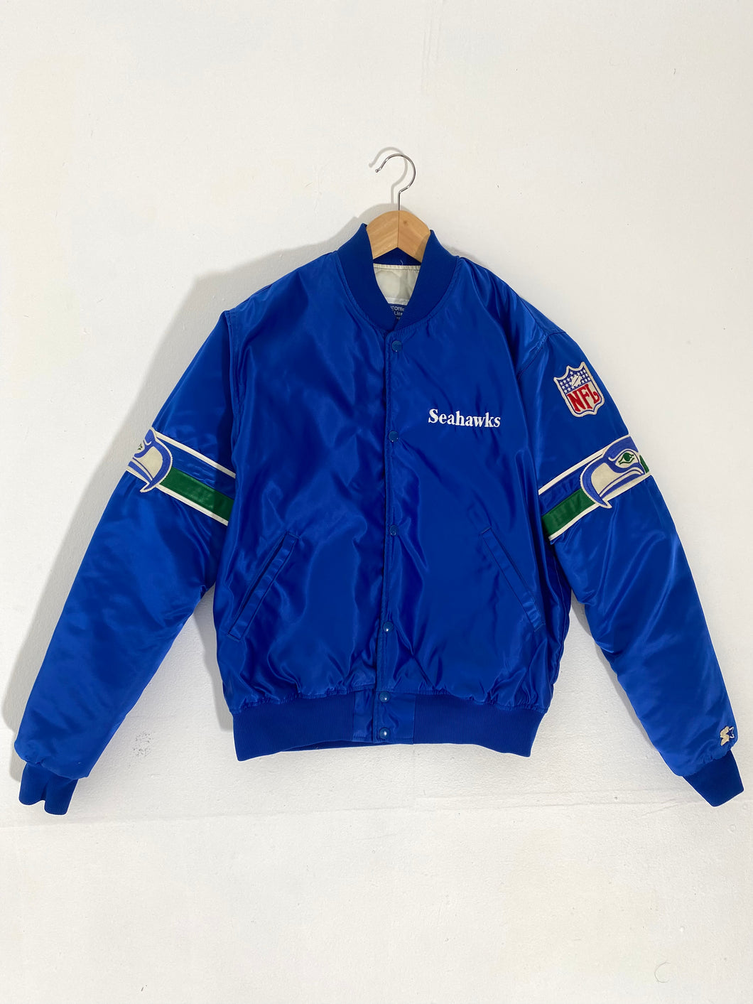 Homage x Starter Seattle Seahawks Satin Jacket from Homage. Officially Licensed NFL Apparel. Shop Pro 80's Starter, Gameday, & Bomber Jackets.