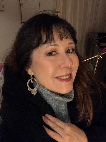 Customer Aileen wearing and loving her custom moonstone chandelier earrings.