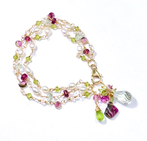 Wire wrapped bracelet of peridot, watermelon tourmaline slices, pearls on triple strands