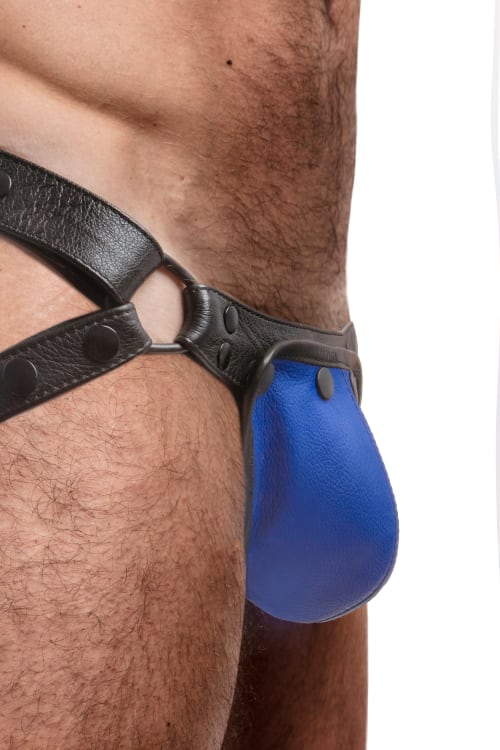 Size chart image of model in a leather jockstrap with a regular sized codpiece