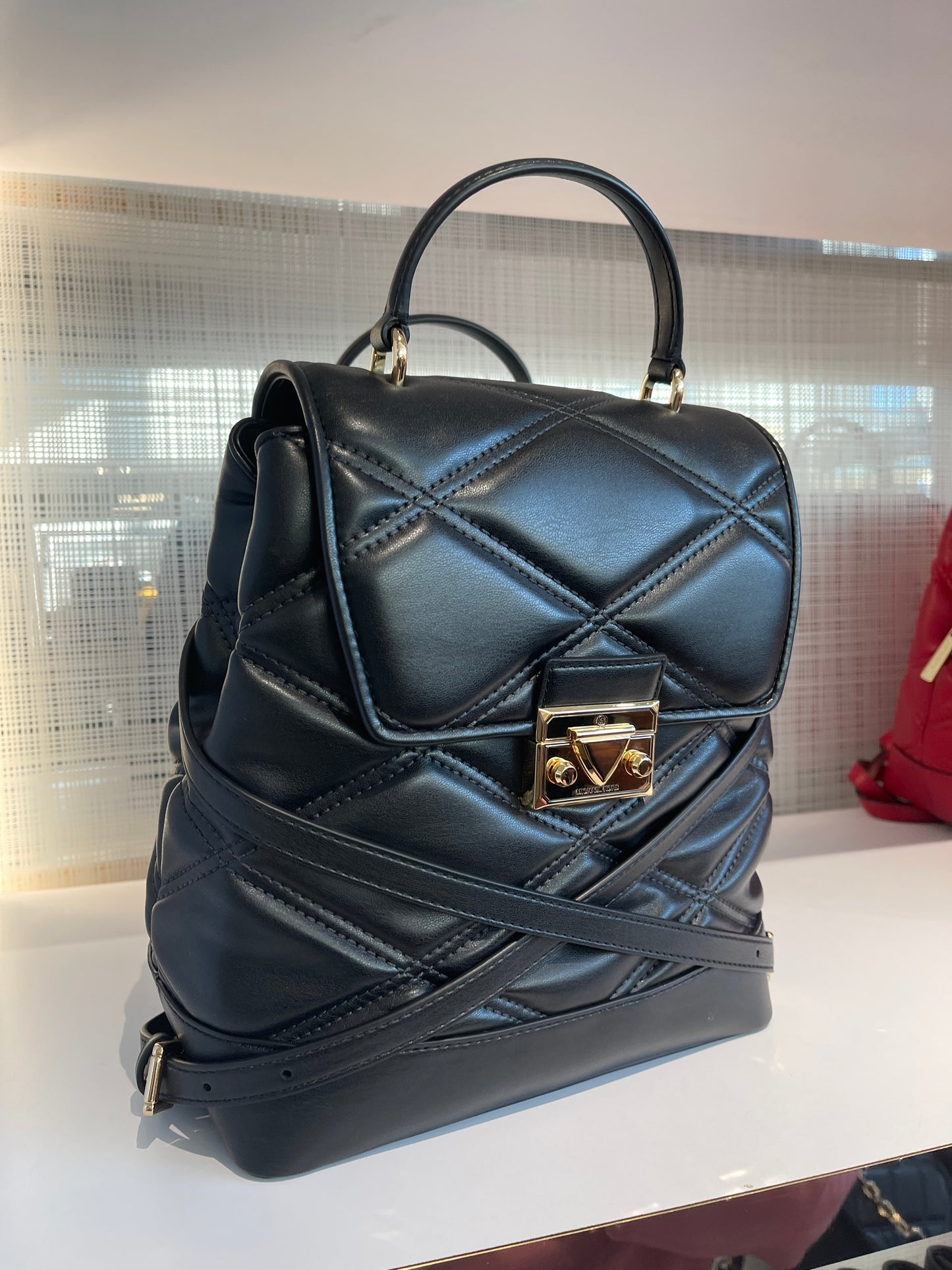 Michael Kors Serena Medium Flap Backpack In Black – SELLECTION