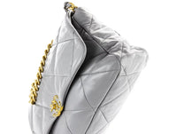 Chanel 19 large handbag, Shiny lambskin, gold-tone, silver-tone