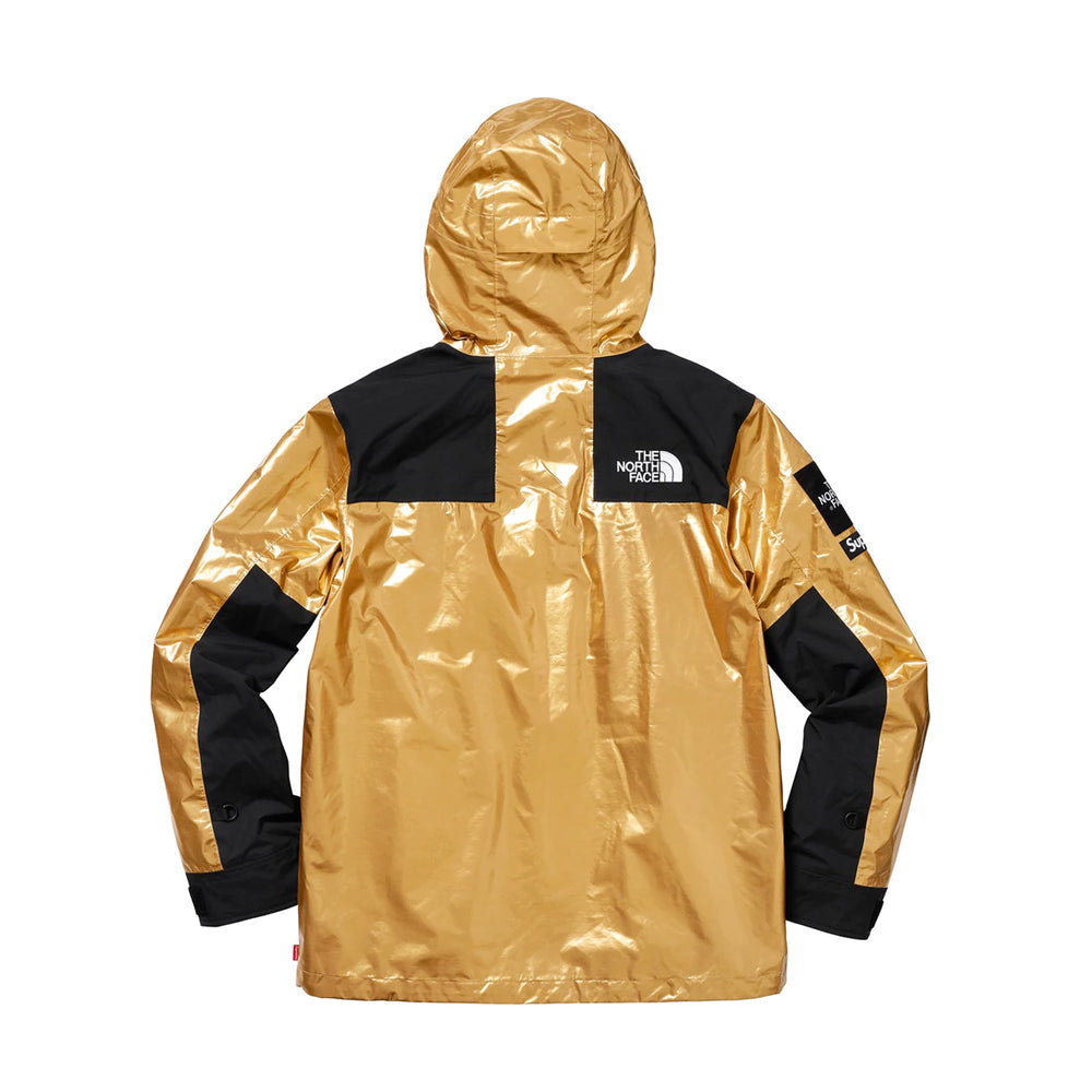 gold north face supreme jacket