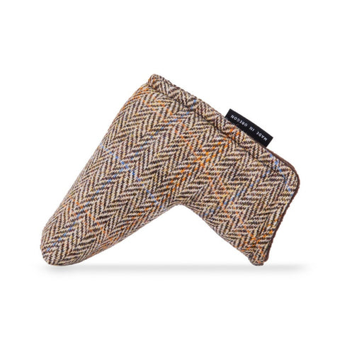 Detailed view of Glen Plaid Brown Harris Tweed blade putter headcover, showcasing the refined herringbone pattern with vibrant stripe accents.