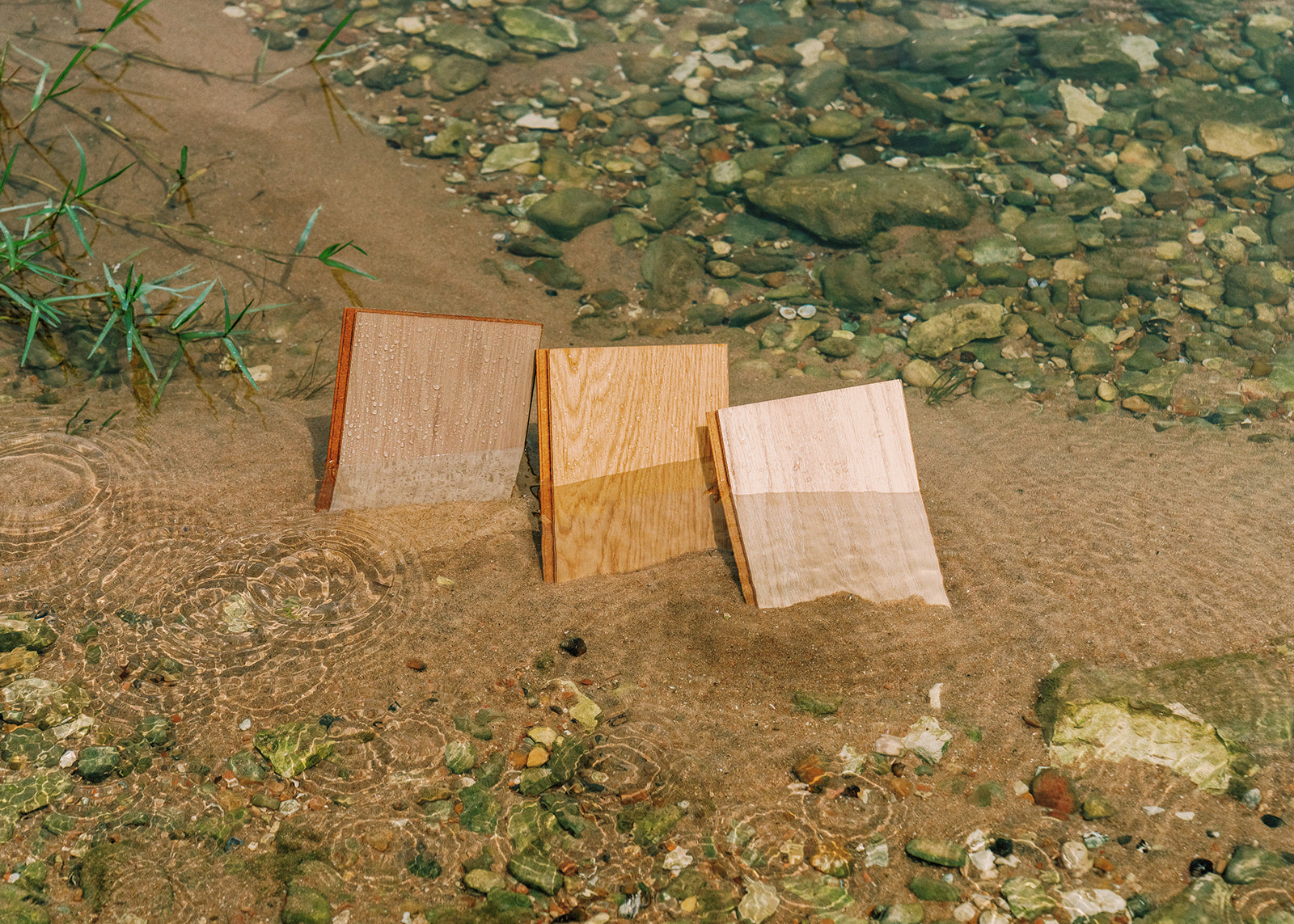 Waterproof wood flooring samples in a natural stream