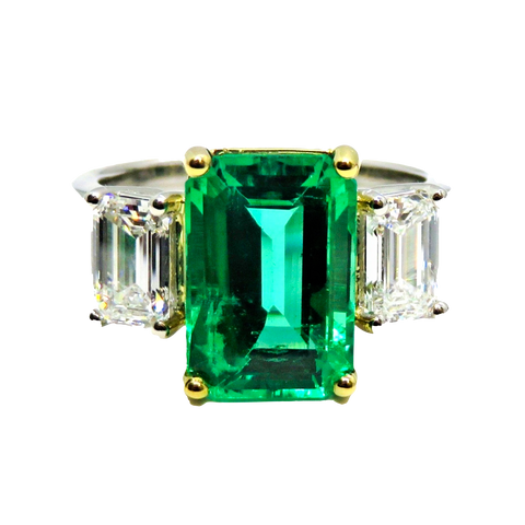 PLATINUM & 18KT YELLOW GOLD 4CT COLUMBIAN EMERALD FASHION RING WITH SIDE DIAMONDS