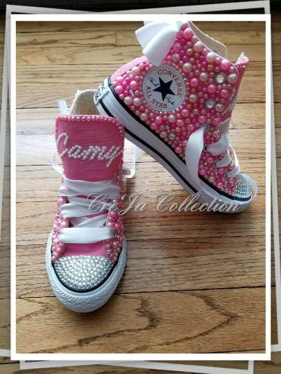 kids pink high top converse