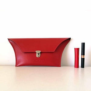 red leather clutch