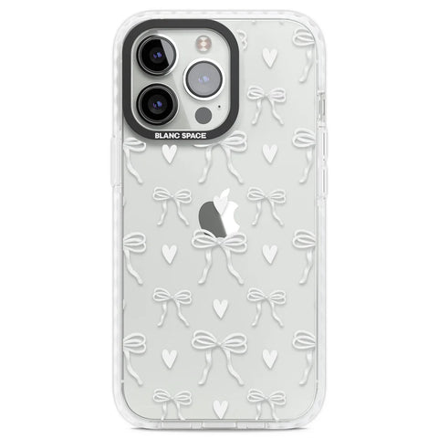 Clear phone case with white bows and hearts design by Blanc Space, combining simplicity and charm for a sleek appearance.