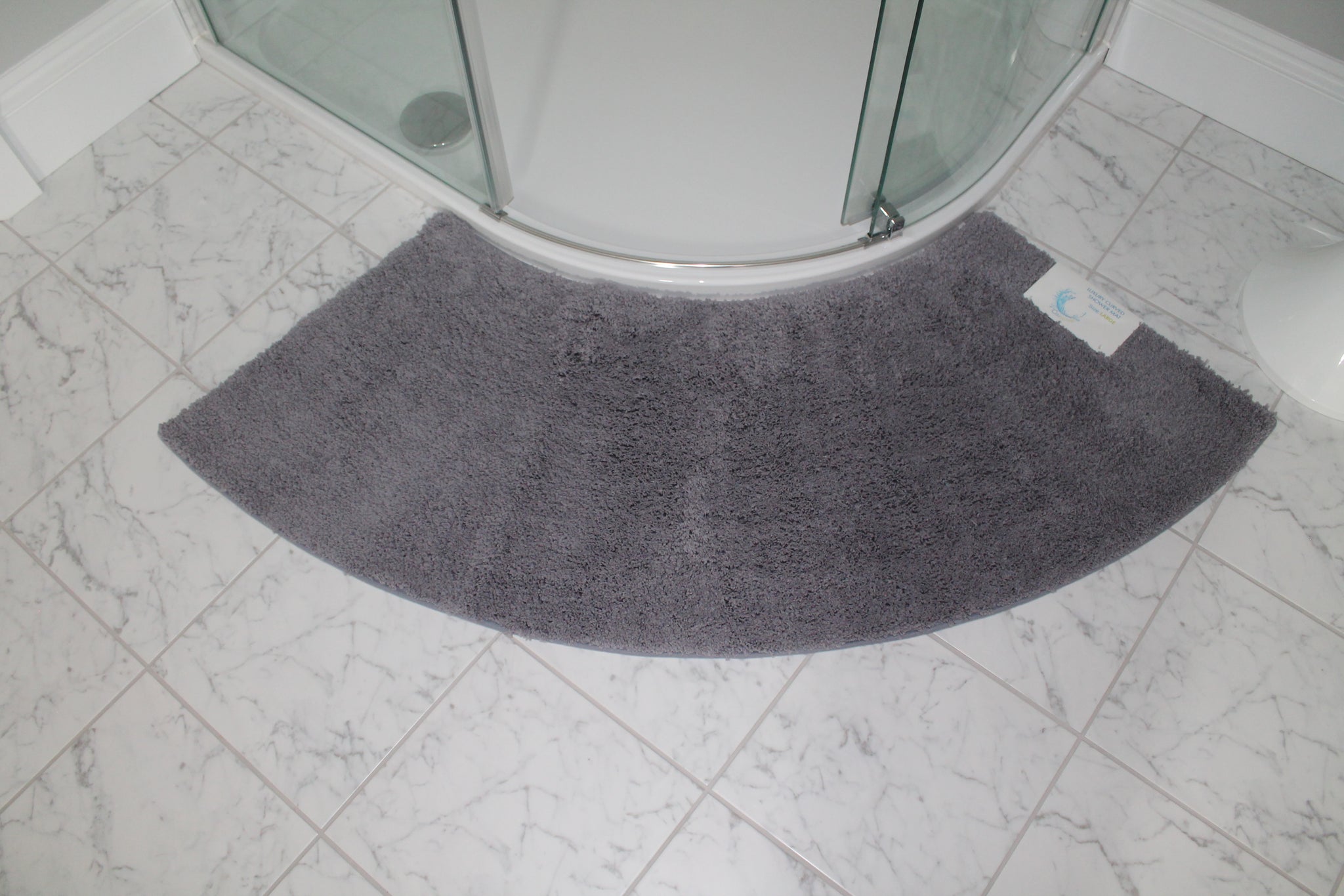 curved bath mat