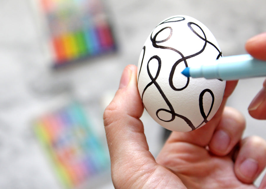 Freehand marker Easter egg decorating