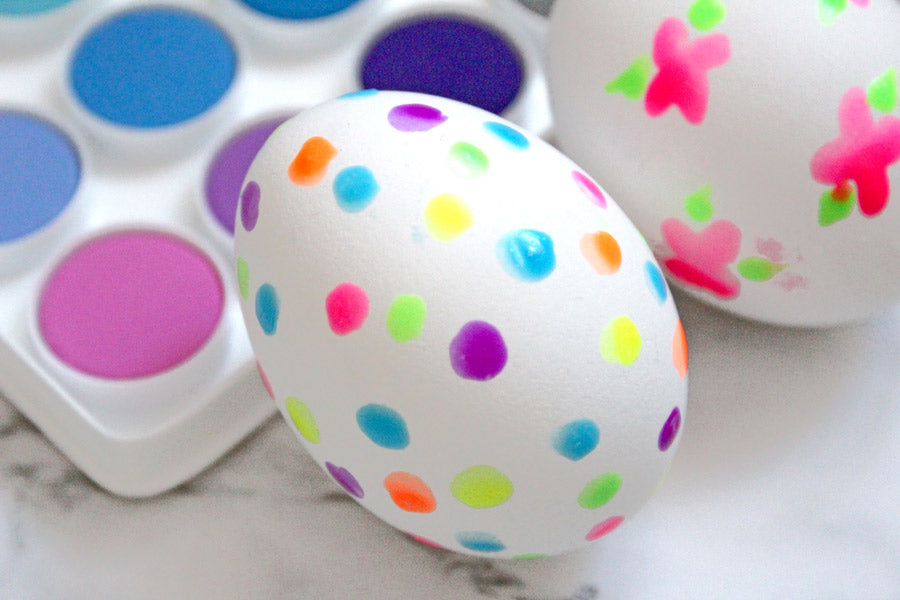 Finished decorated Easter egg with neon colored OOLY Puffy Paint dots