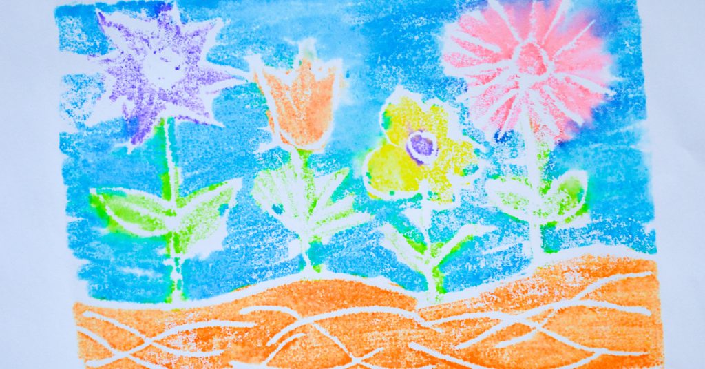 flowers against a blue sky with brown ground on white paper