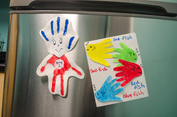 Our Dr. Seuss craft creations are appropriately placed on the fridge