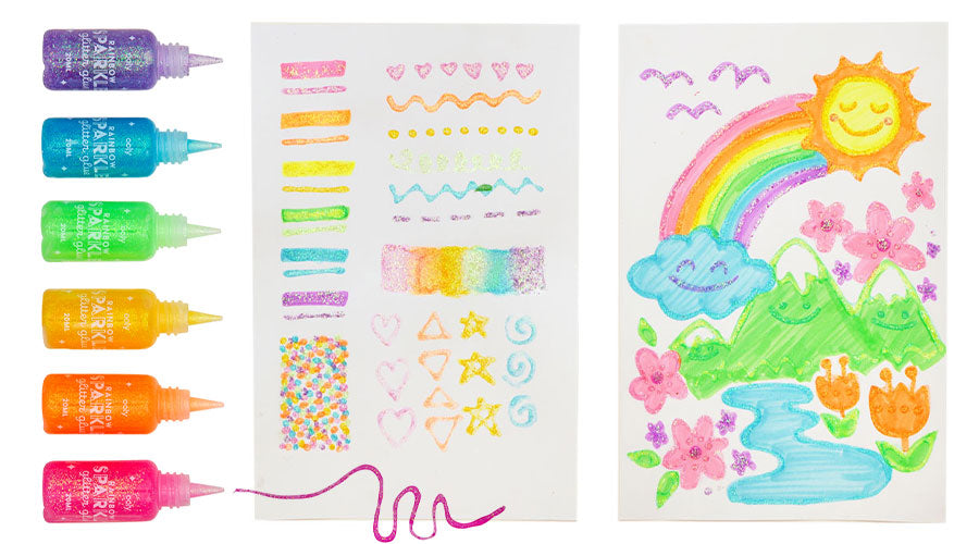 rainbow of glitter glue bottles next to glitter art on white paper
