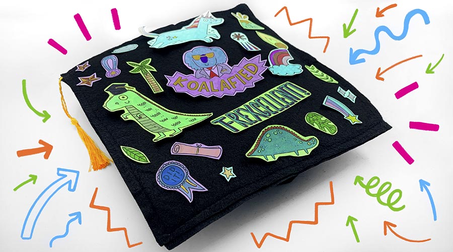 graduation cap with colorful printables on white background with colorful doodles