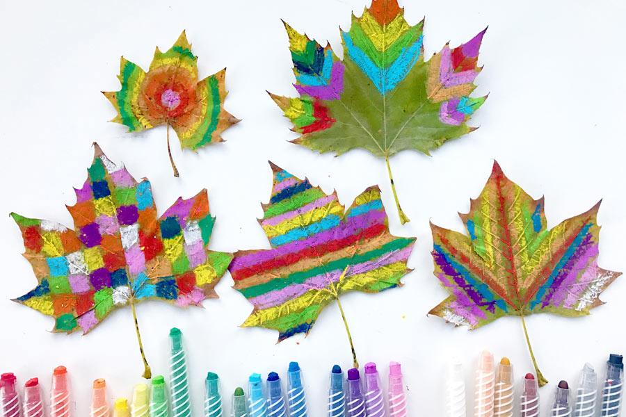 decorate fall leaves with bright oil pastels