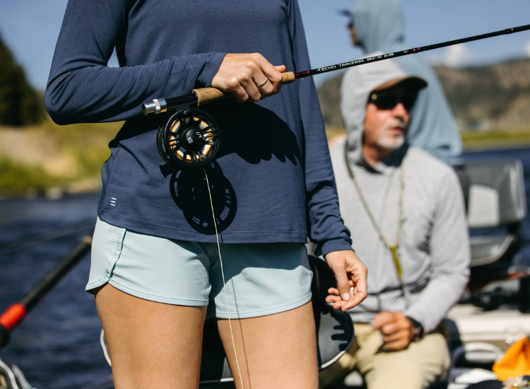 Woman wearing lightweight fishing shorts