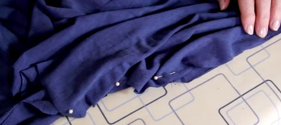 Pinning sleeve head to back and front of garment