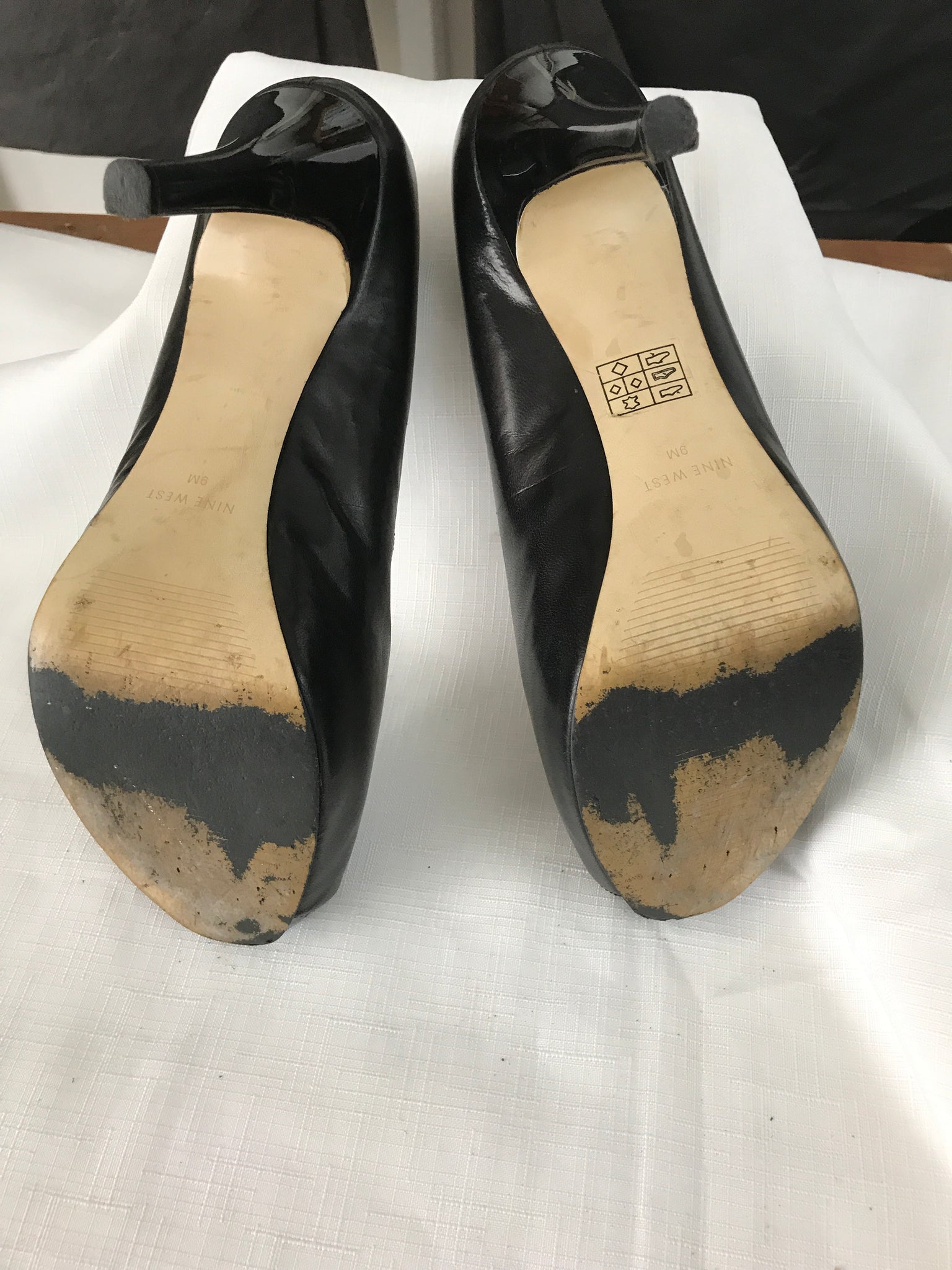 nine west black peep toe pumps