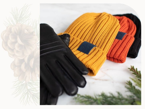 Three ribbed hats are shown, in gold, orange and black. A pair of black leather gloves is also shown.