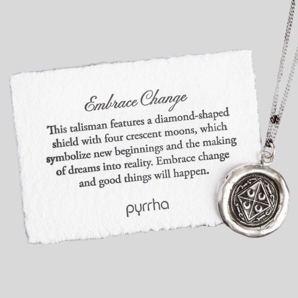 A pendant is shown, with a card that reads Embrace Change. This talisman features a diamond-shaped shield with four crescent moons, which symbolize new beginnings and the making of dreams into reality. Embrace change and good things will happen."