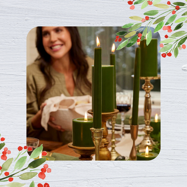 A party table is shown, with a woman smiling in the background. In the foreground, green candles from the Thymes Frasier Fir Collection are shown in various sizes.