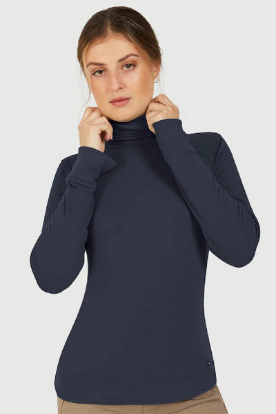 Fig turtleneck is shown on a model in a dark blue colour