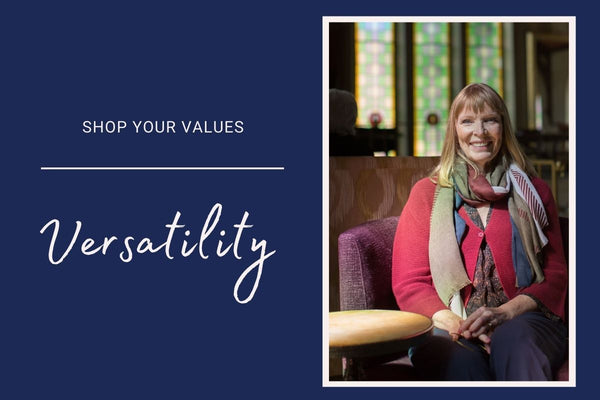 On the left, a headline reads: Shop Your Values - Versatility. In the photograph, Judy MAtheson sits in a chair with a large stained glass window behind her. She smiles at the camera and is dressed in a red cardigan, a multicoloured scarf.