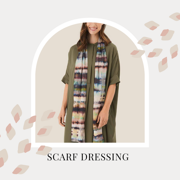 A woman wears a printed scarf. Text reads: Scarf Dressing