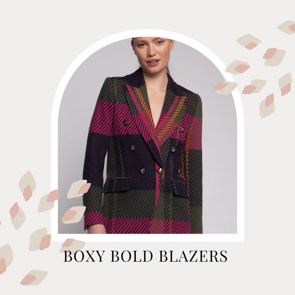 A woman wears a tartan blazer. Text reads: Bold boxy blazers
