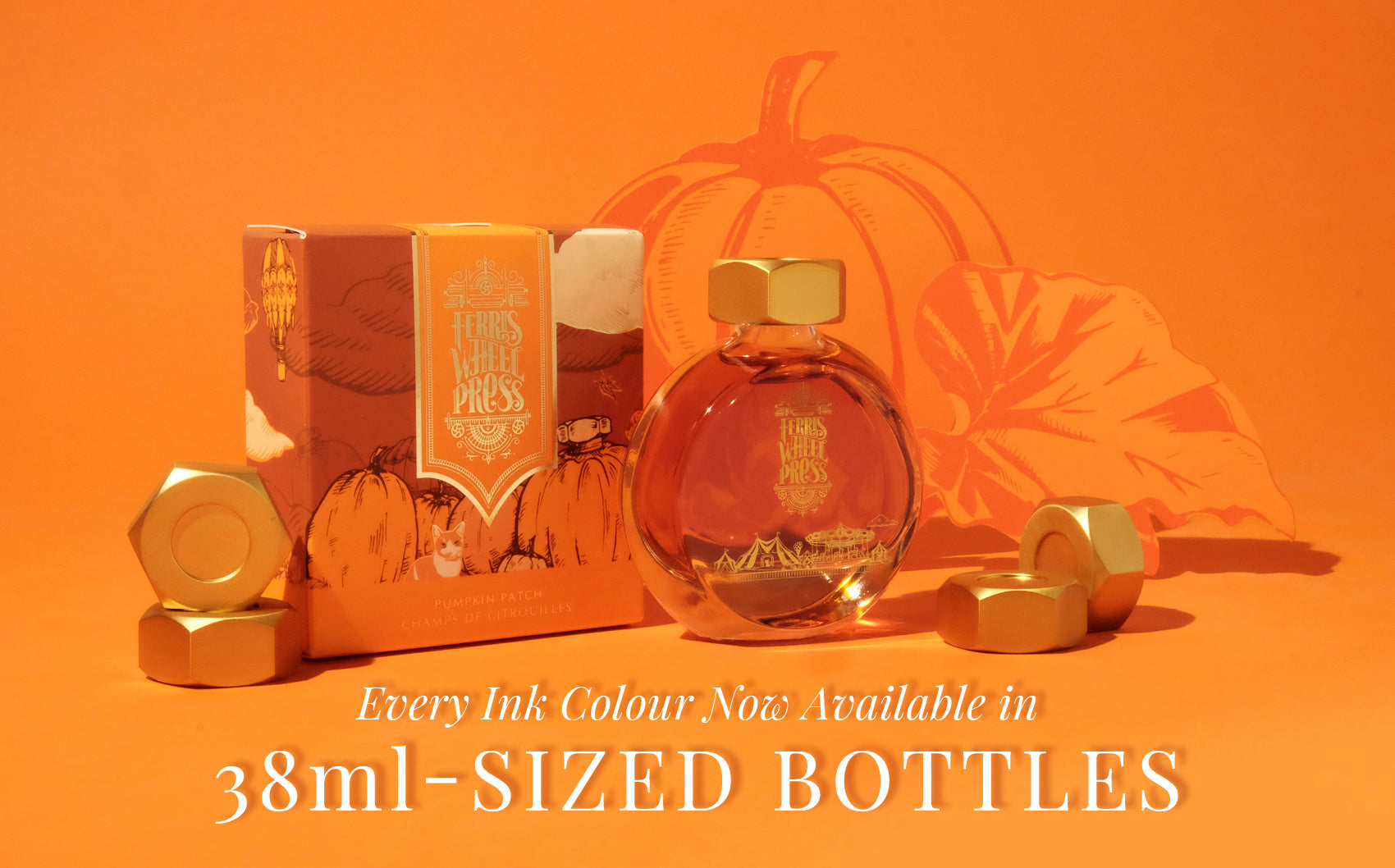A 38mL of orange ink with the Ferris Wheel Press logo in gold surrounded by paper cut outs of hand-drawn pumpkins.