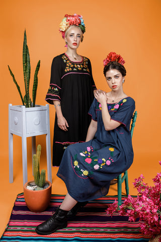 Models wear the monstera necklace, drop earrings, bracelets and rings for the Frida Kahlo Collection lookbook