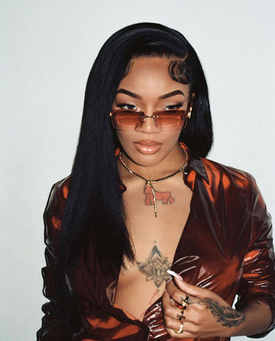 Glorilla, Big Glo, female rap artist, wears Cartier style wood sunglasses by Vintage Wood Collection in The Cut magazine photoshoot