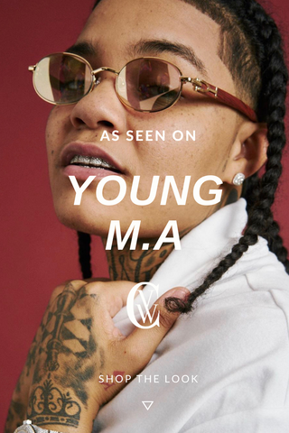 Rapper Young M.A wearing Cherry wood sunglasses by Vintage Wood Collection similar to Cartier style glasses