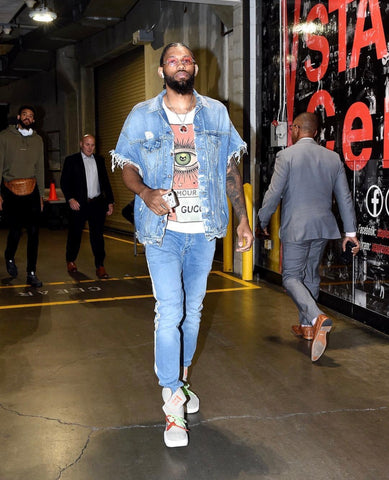 deandre bembry atlanta hawks basketball player wearing pink wood glasses.jpg