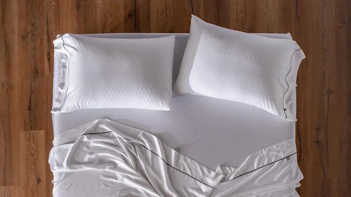 Bed with two pillows in white Layla Bamboo pillowcase and sheets set