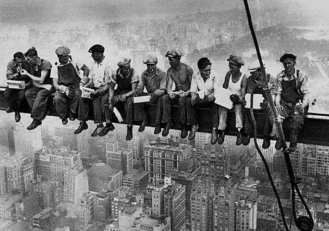 Irish workers lunching on a steel beam