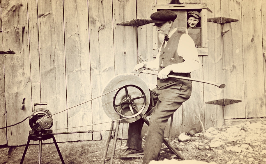 Man-grinding-axe-vintage.jpg